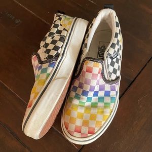 Kids Vans rainbow and black checker slip-ons